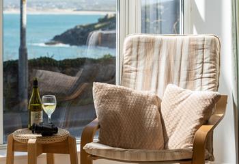 Take in the wonderful sea views over Porthminster beach from this comfortable armchair.
