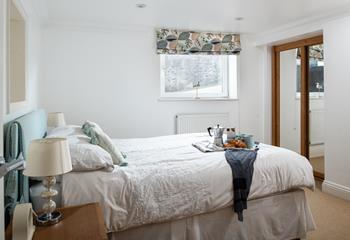 Bedroom 1 is spacious with full-length mirrors to help you choose the perfect outfit for the day.