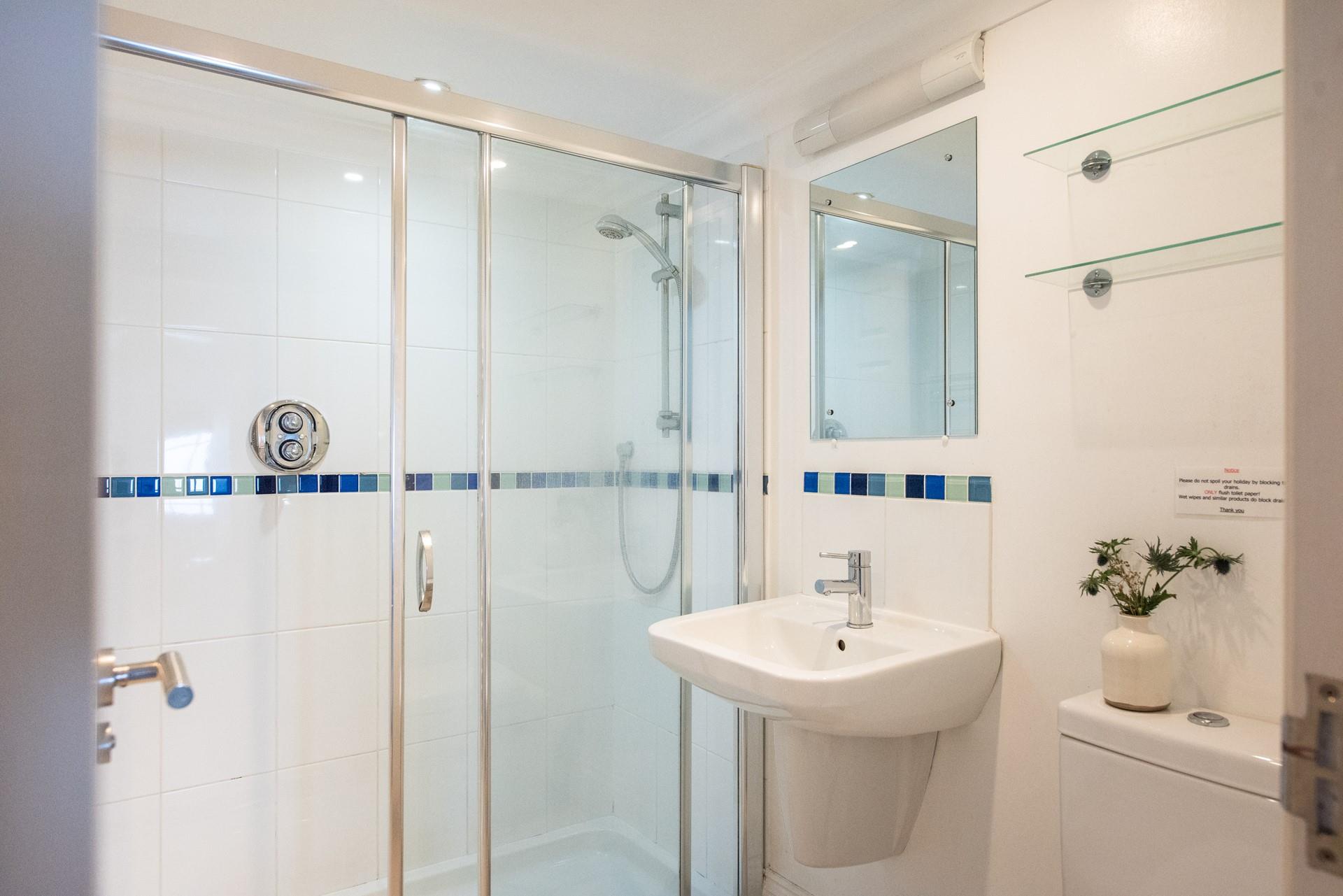 Wash off sandy toes in the shower after spending the day on Porthminster.