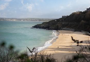 Watch the sea ebb and flow on Porthminster beach each day.