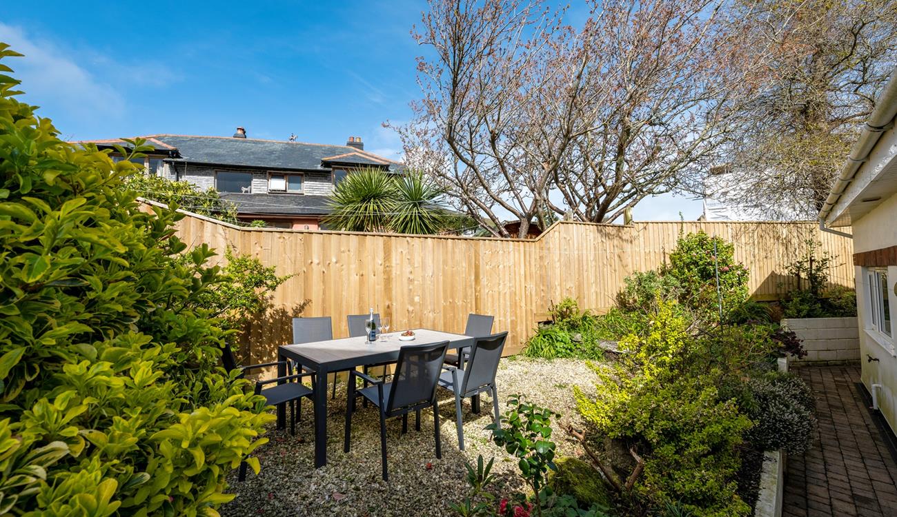 Dine al fresco as a family whilst the sun sets. 