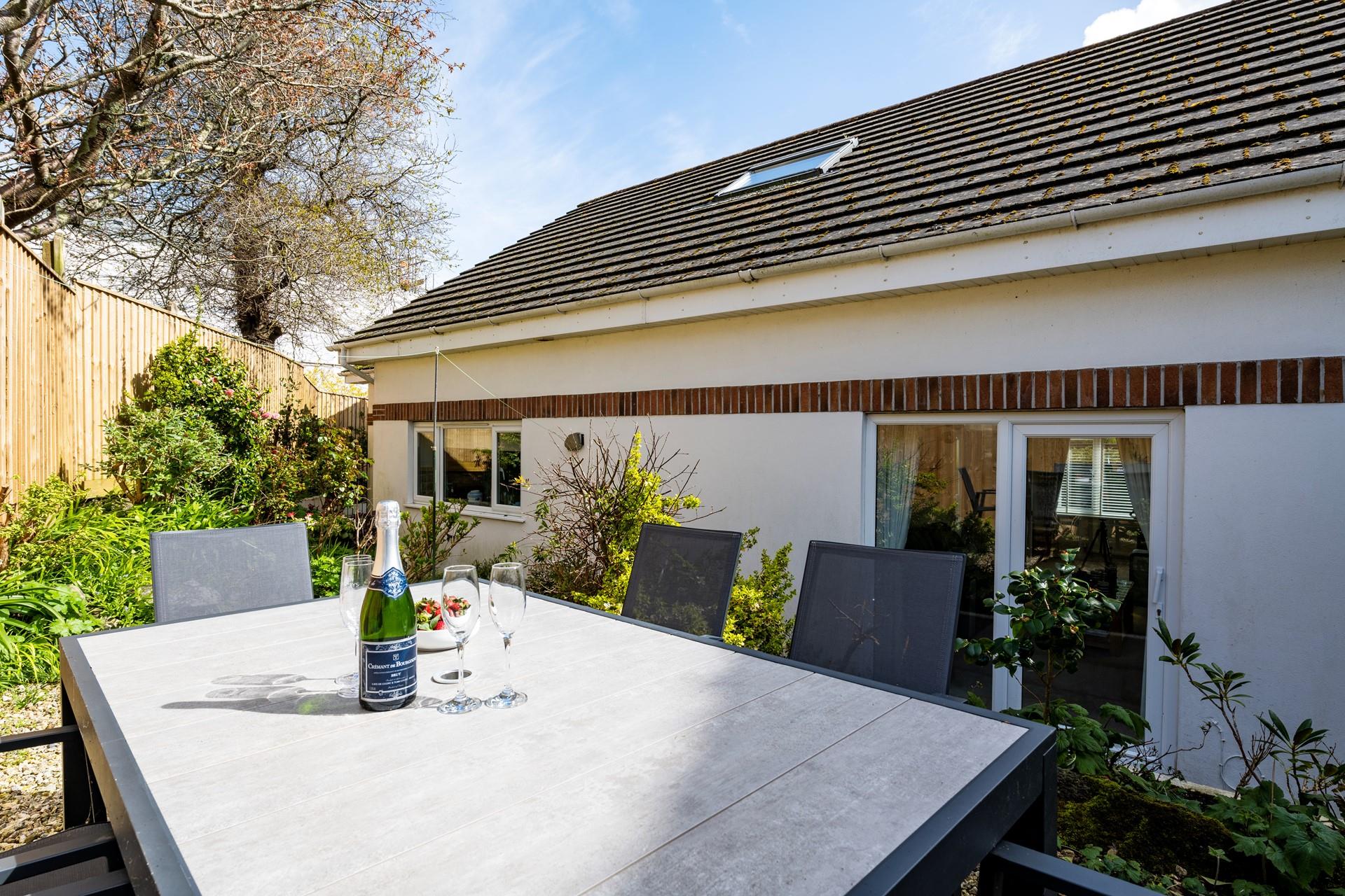 Open a bottle of your favourite wine to sip as the sun comes down.