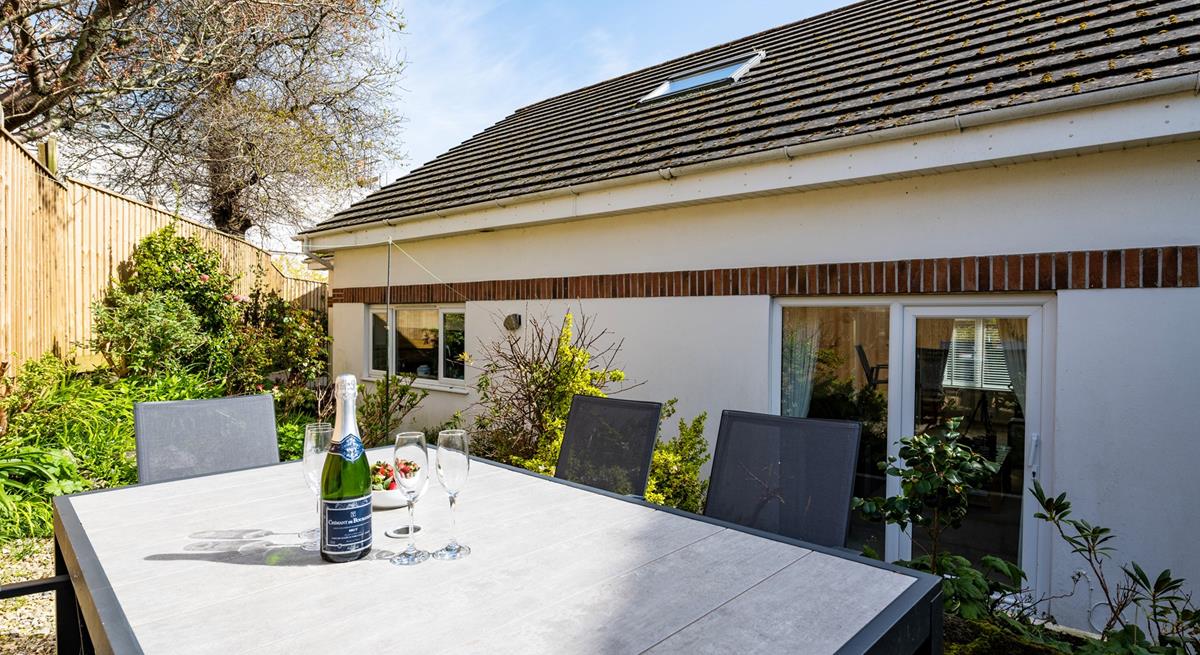 Open a bottle of your favourite wine to sip as the sun comes down.