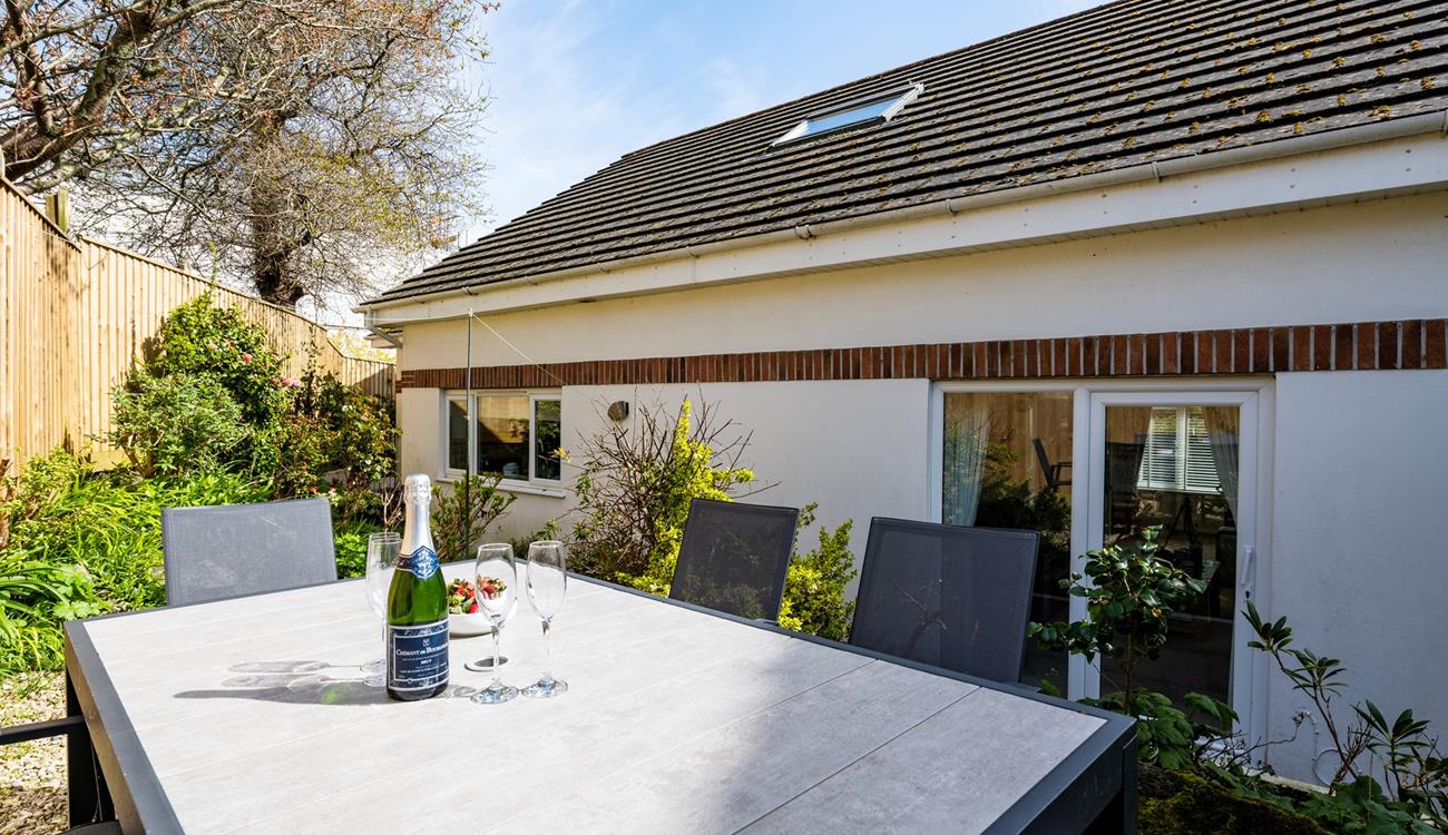 Open a bottle of your favourite wine to sip as the sun comes down.