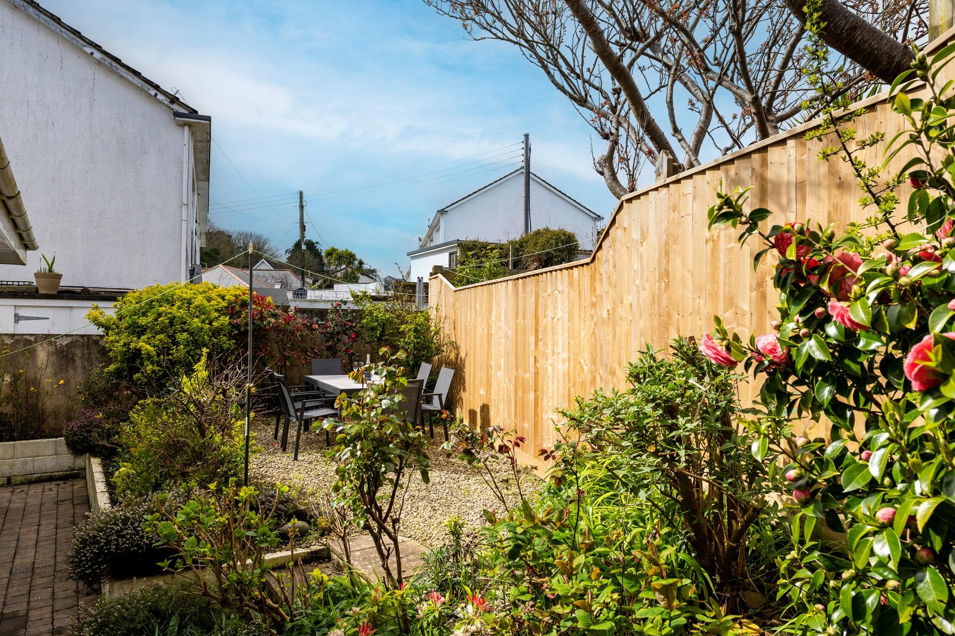 The terraced gravel area is perfect for a little sunbathing or a glass of wine and a good book.