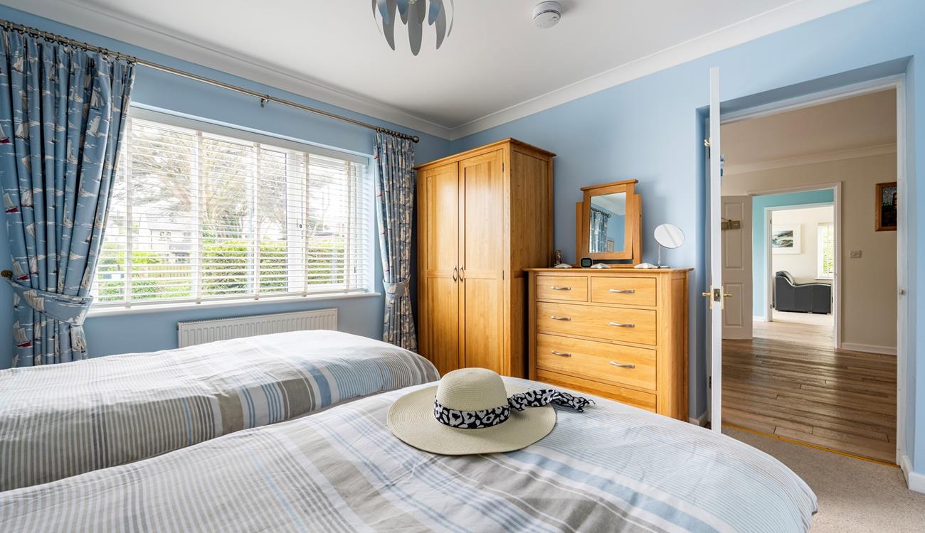 The twin beds are perfect for children or adults to drift into a dreamy slumber.