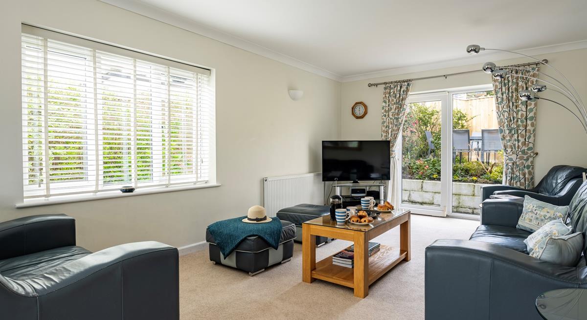 After a day spent on the beach come back to relax on the sofa with a glass of wine.