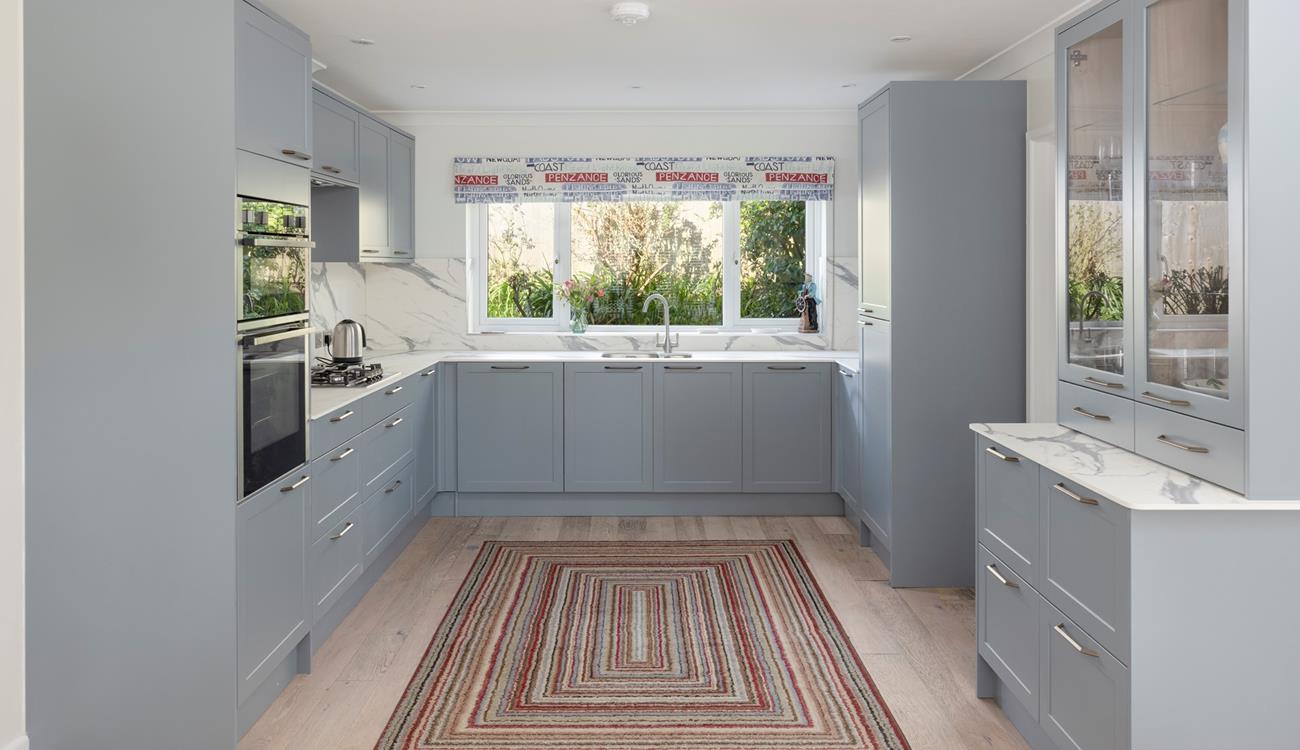 Enjoy cooking meals in the large, bright kitchen!