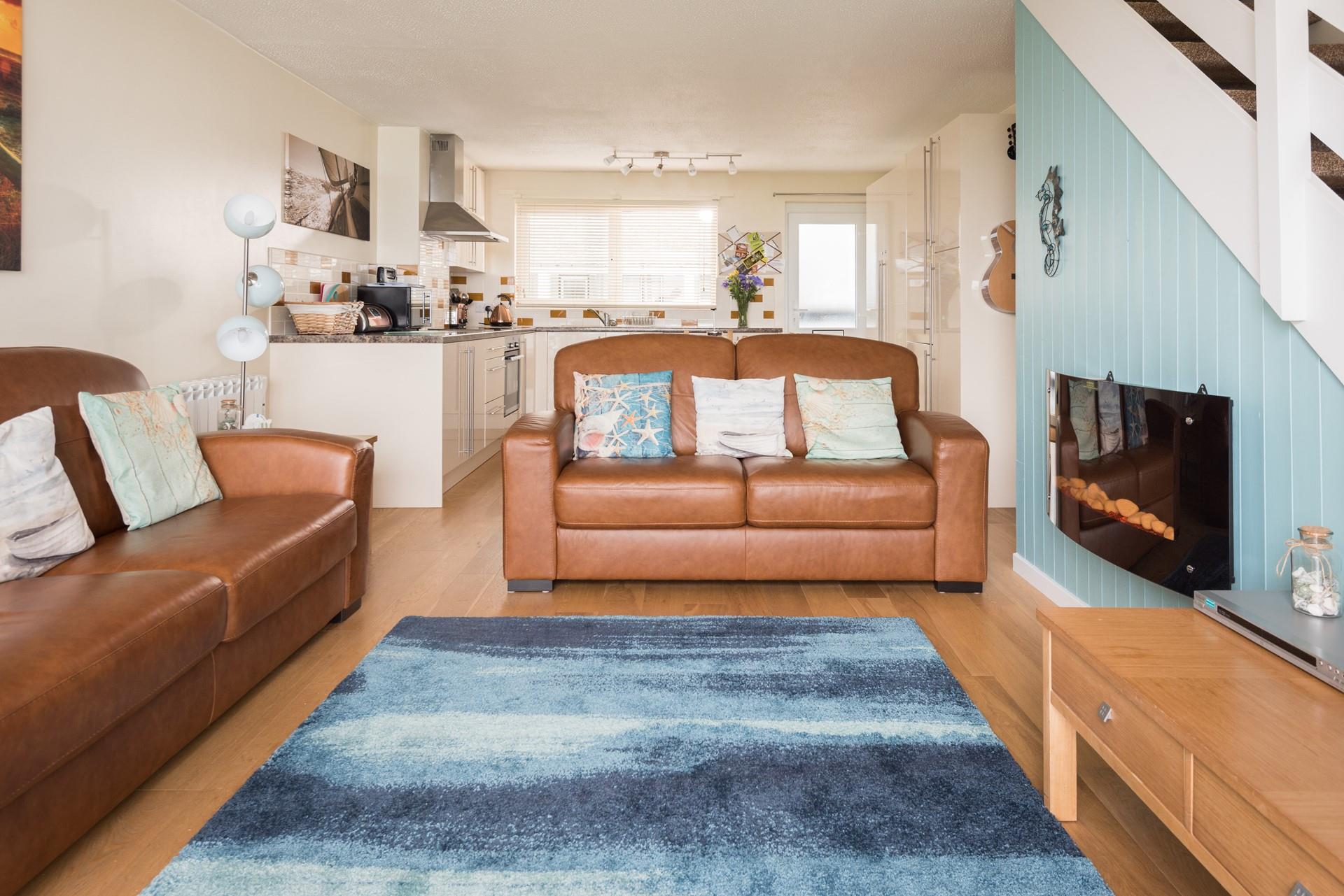 Put the fire on in the evenings and get cosy in the living room.