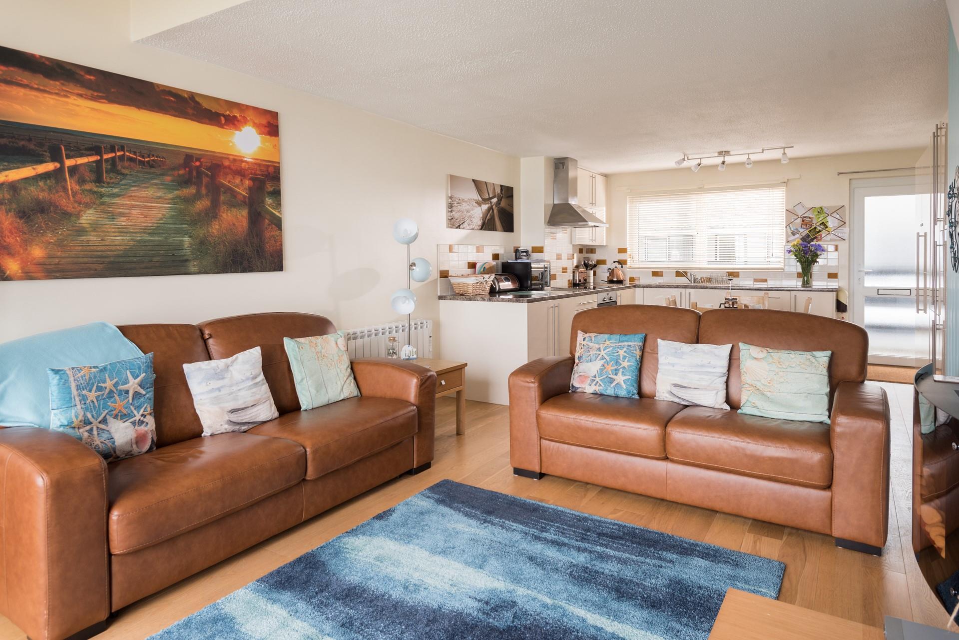 The open plan living area makes this the perfect space for entertaining.