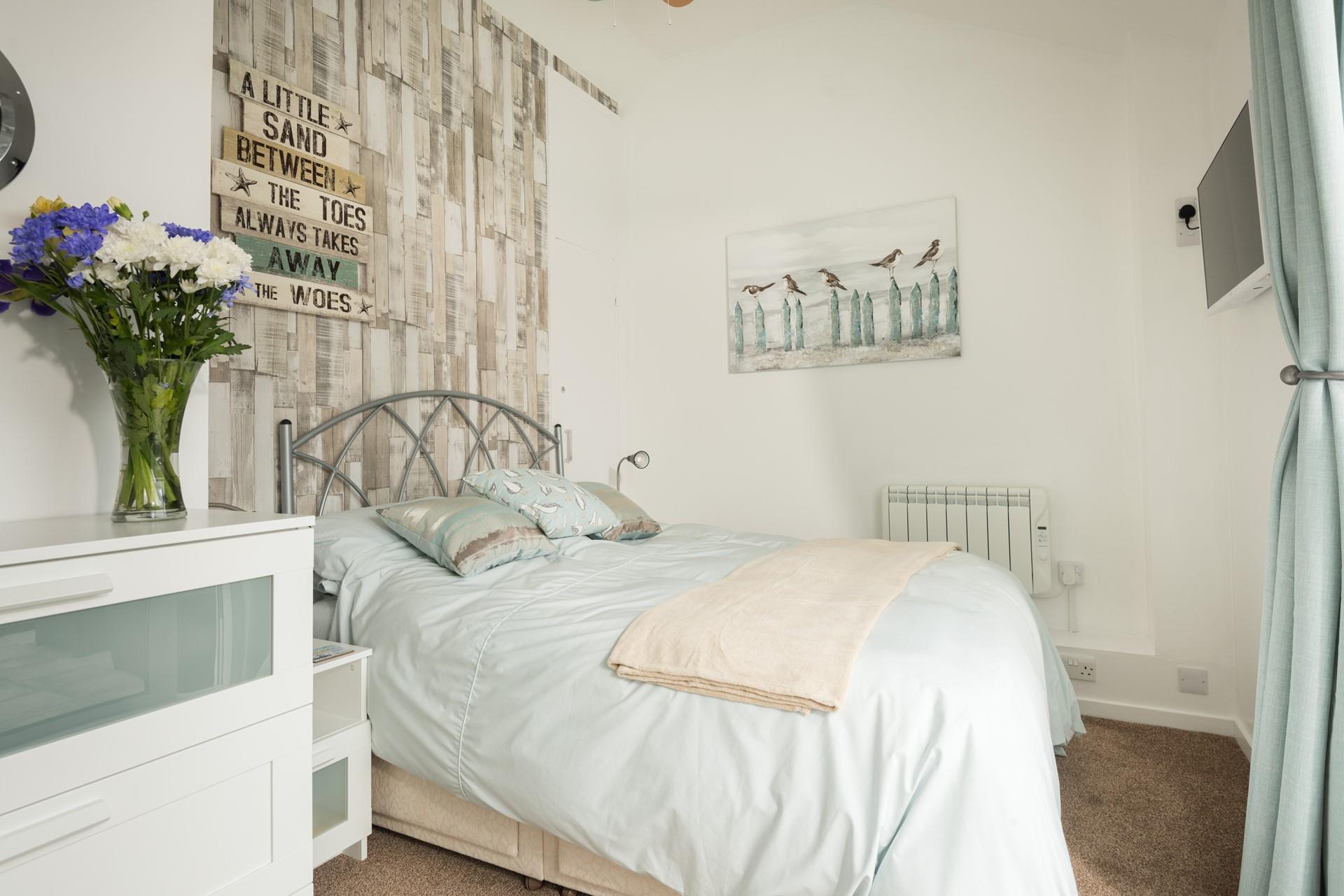 Snuggle into bed after spending the day splashing in the sea.