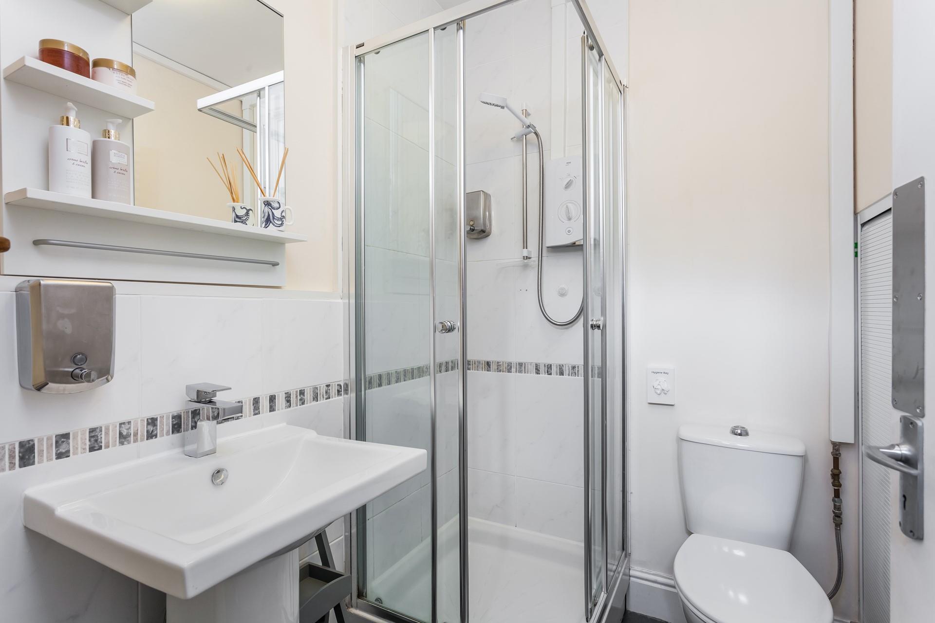 Wash off your sandy toes in the shower.