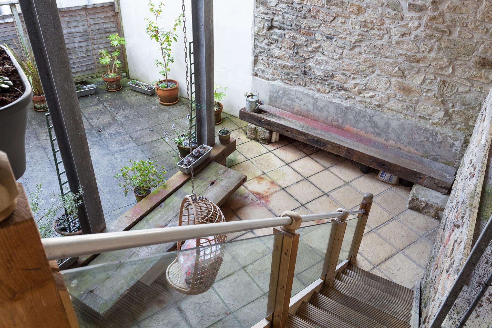 Take a moment to relax swinging in the egg chair.