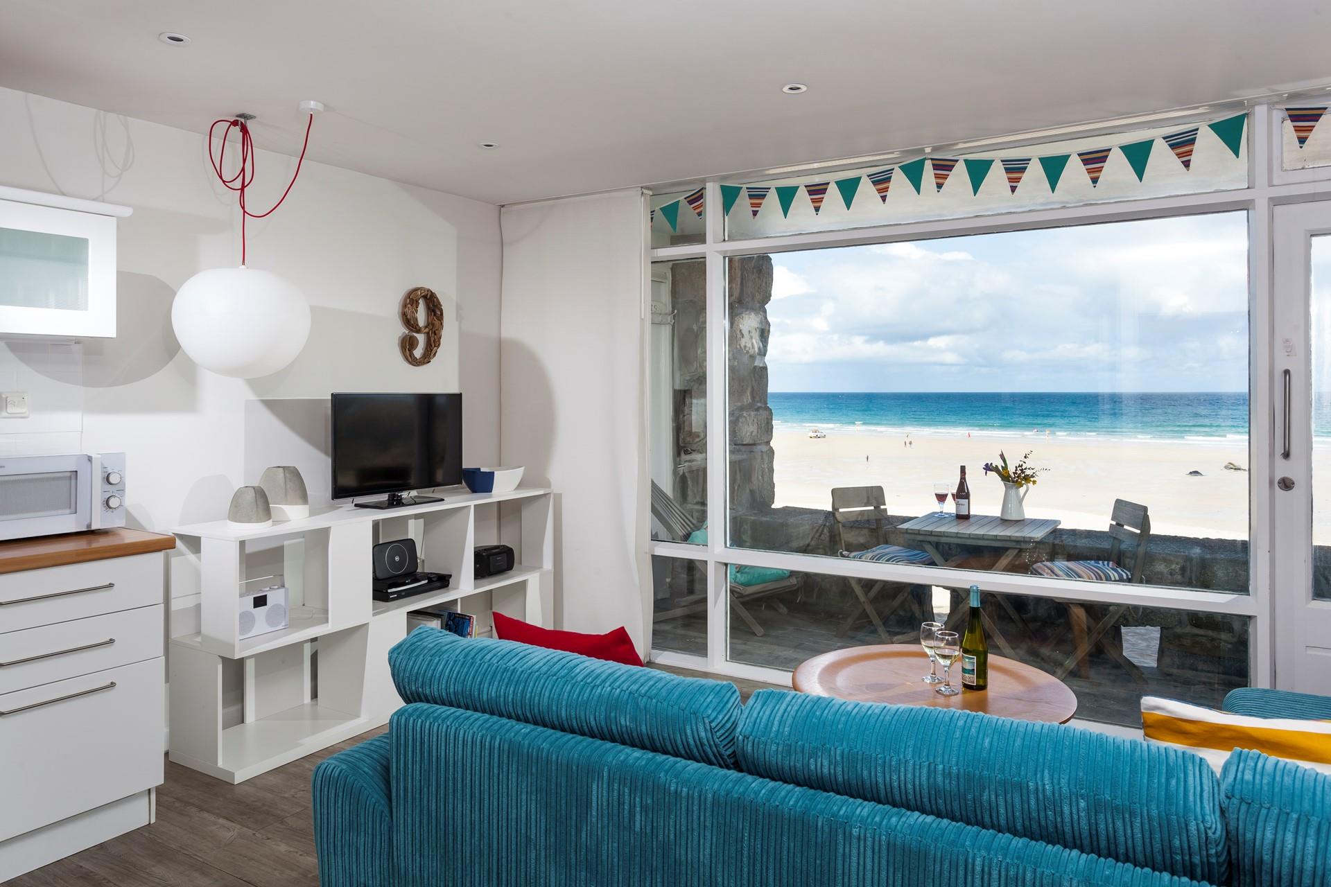 Pour yourself a drink and enjoy the stunning views from the sitting room.