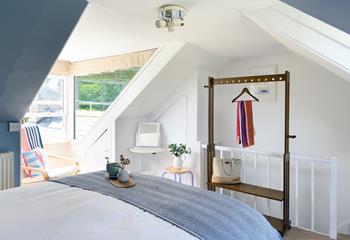 Bright and airy, this bedroom is located on the top floor.