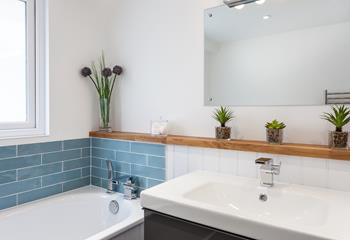 The first floor bathroom is the perfect space to get ready for an evening out in town.
