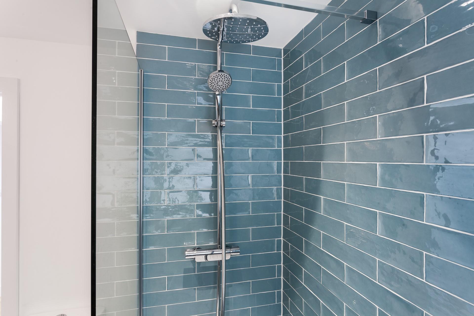 You can wash off your sandy toes in the rainfall shower.