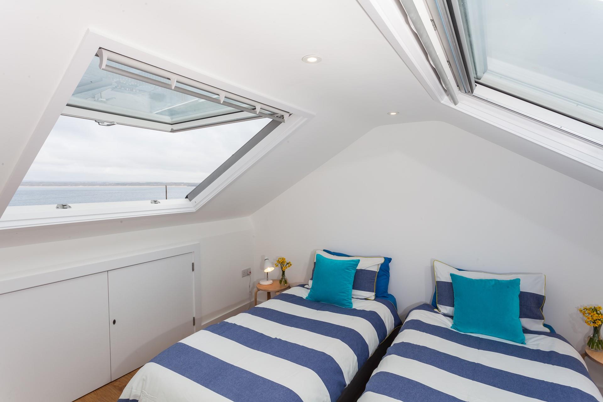 Bedroom 2 has twin beds and views across St Ives Bay.