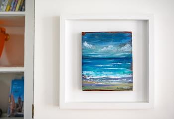 Added touch of original oil paintings from local artists making it a home from home.