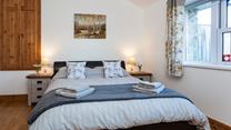 The property's secluded rural location and luxurious king size bed promise a perfect night's sleep.