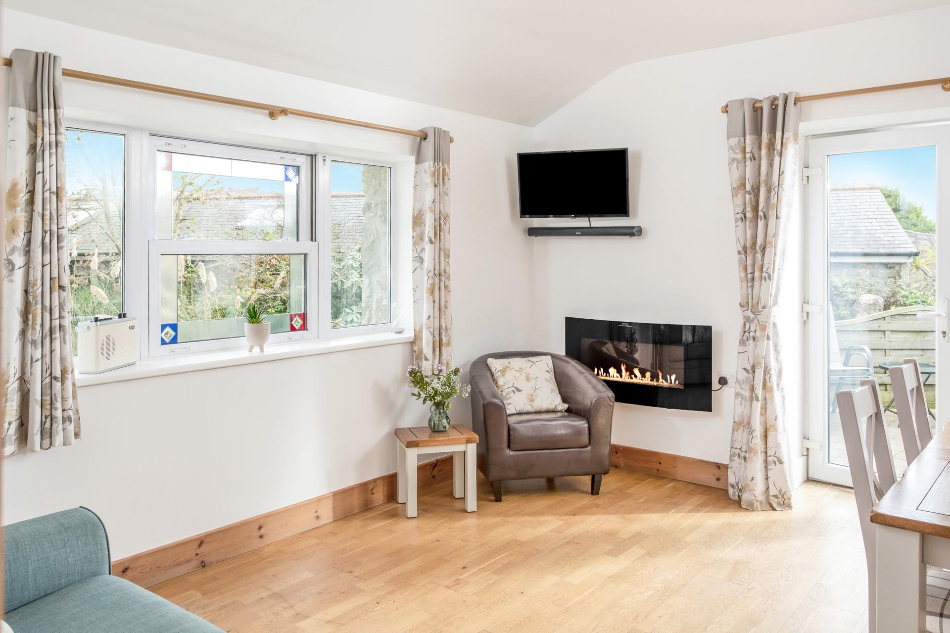 After a fun-filled day exploring St Ives, cosy up in the sitting room for an evening of films or kick back on the armchair with a good book. 