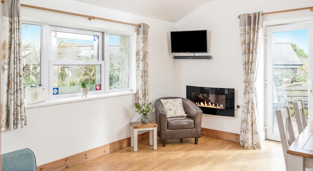 After a fun-filled day exploring St Ives, cosy up in the sitting room for an evening of films or kick back on the armchair with a good book. 