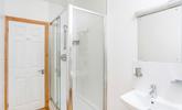 Start your day with a hot shower in the bright and fresh bathroom or wash away the sand after a day of coast path exploration!  - Thumbnail Image