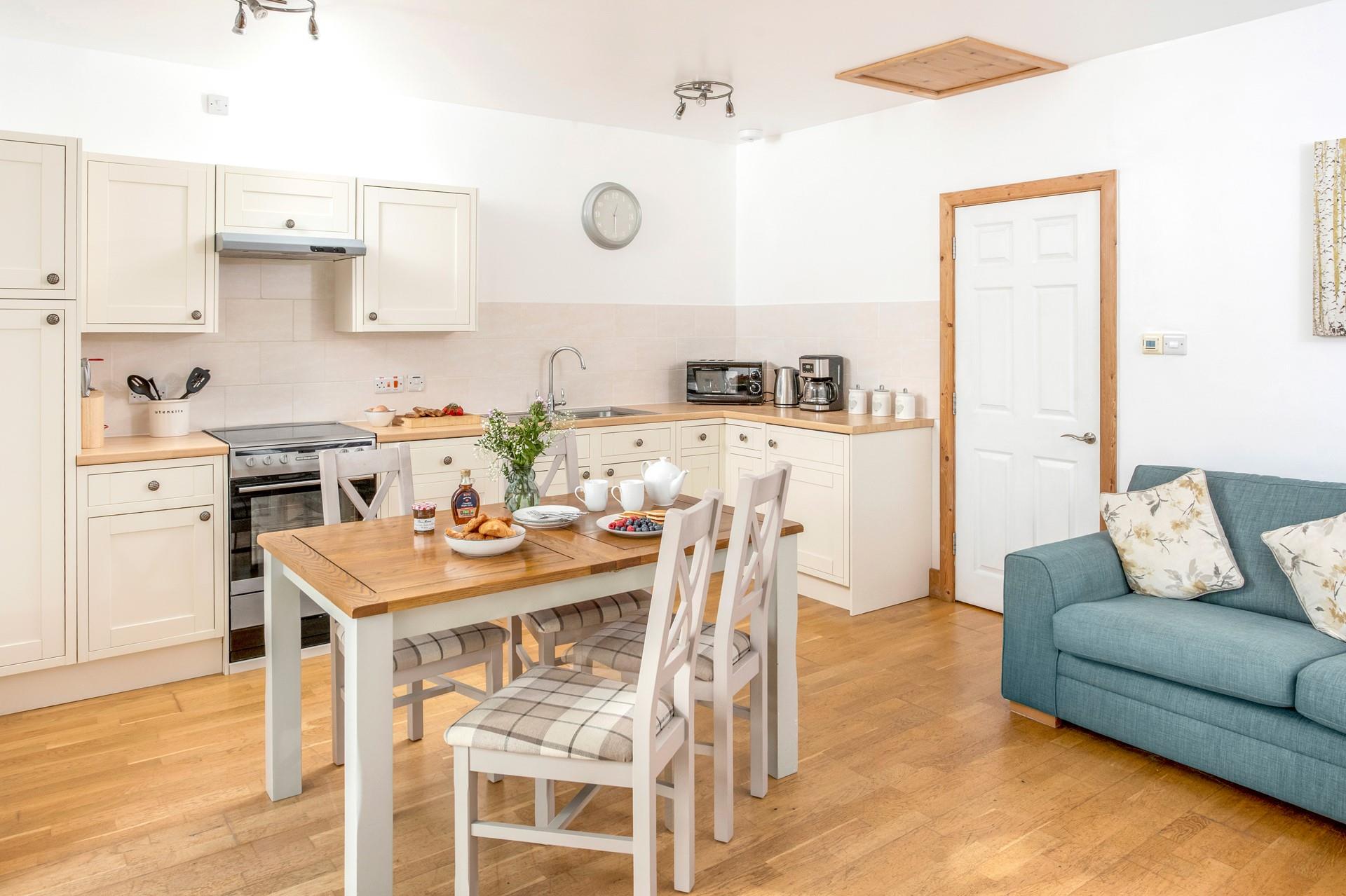 The dining area offers ample space to enjoy delicious home-cooked meals.