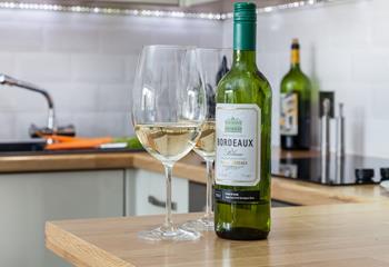 Enjoy a relaxing glass of wine whilst you cook up a feast in the kitchen area.