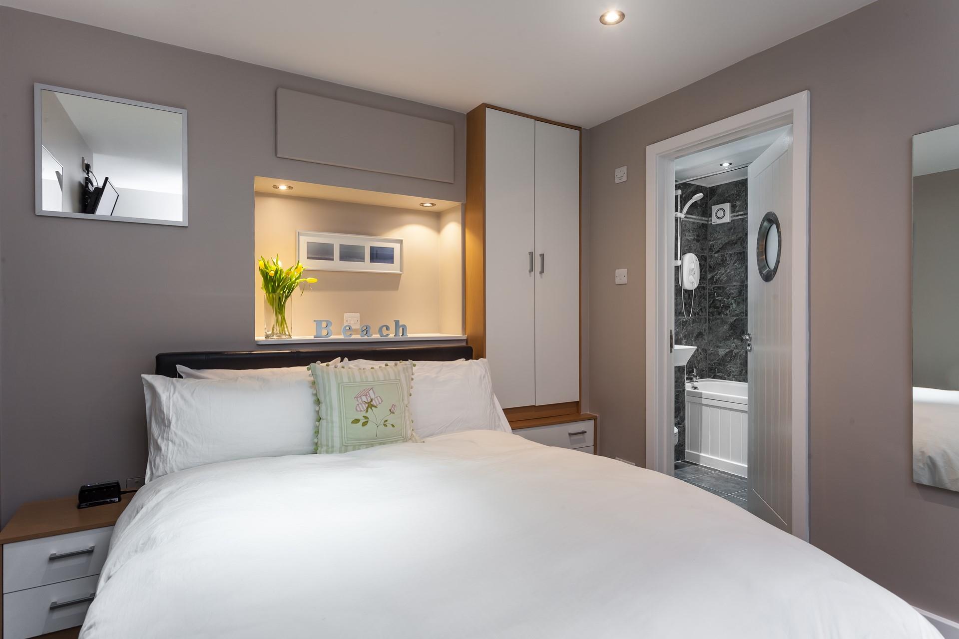 Wake up and wander into the en suite to get ready for the day.