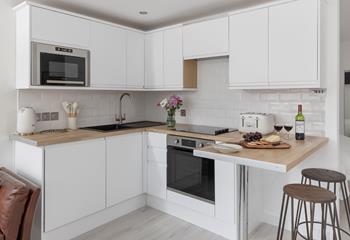 Start the day with warm pastries at the breakfast bar.