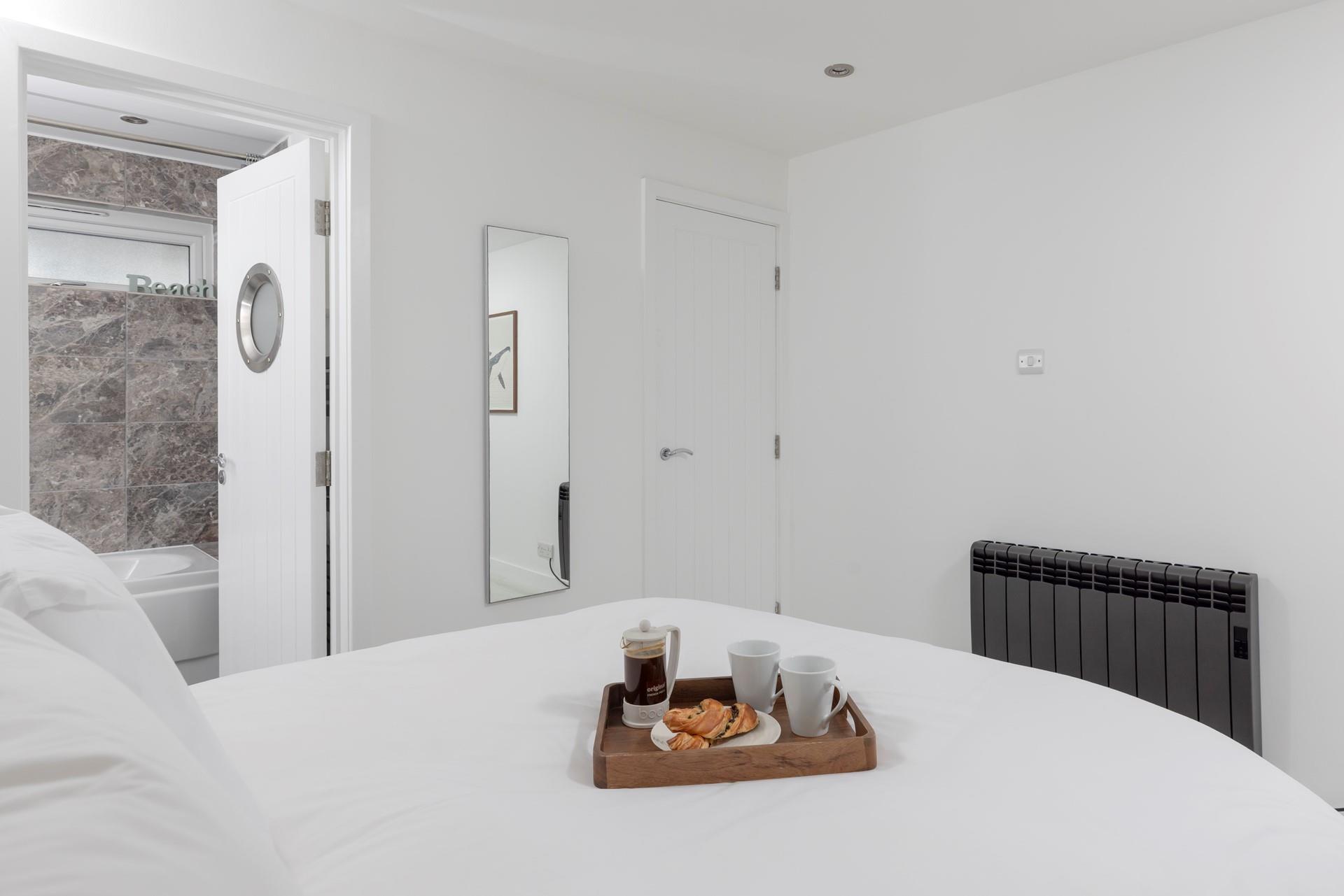 The handy en suite is ideal for getting ready each morning.