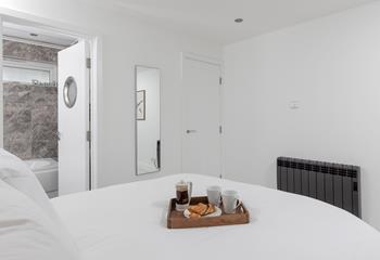The handy en suite is ideal for getting ready each morning.