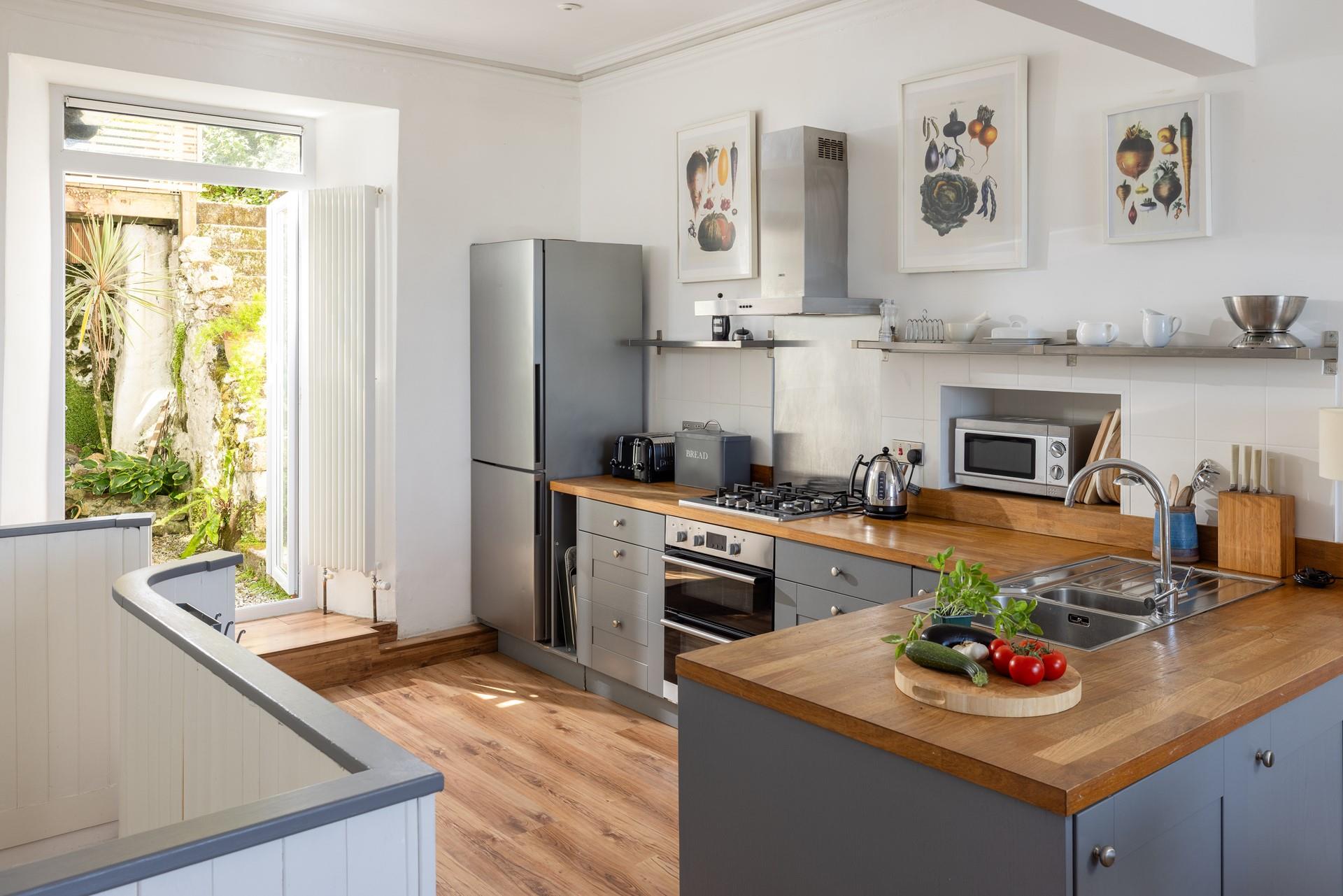 Cook up a storm in the well-equipped kitchen.