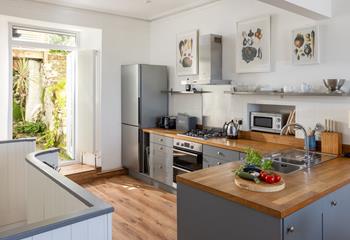 Cook up a storm in the well-equipped kitchen.