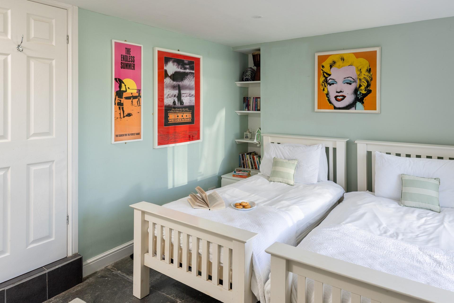 The lower ground floor has twin beds for additional guests.