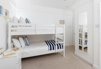 Settle the kids into the bunk beds and head out to the balcony for a cocktail in the evening sun.