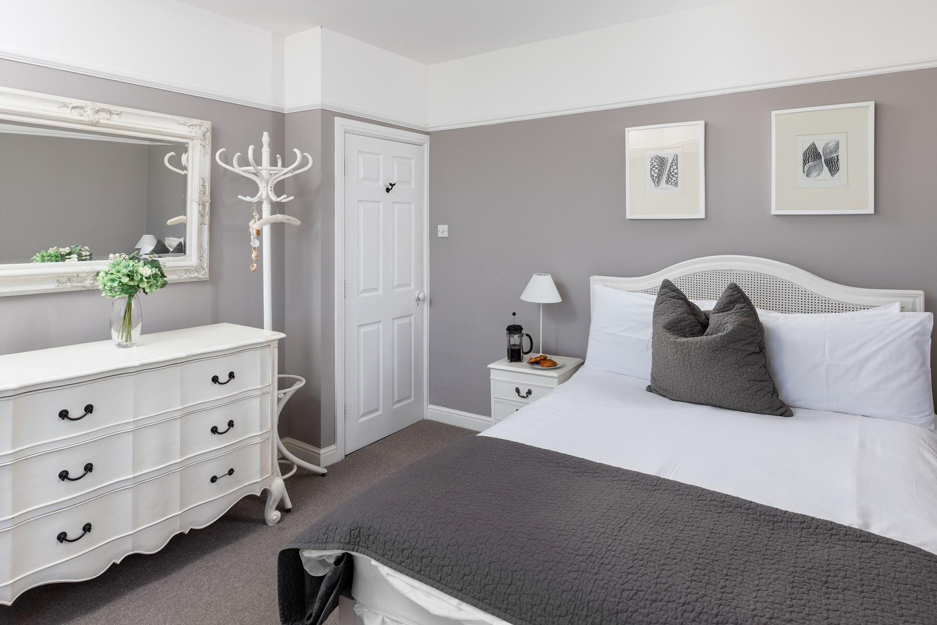 Settle under the covers of the king size bed and rest for the night amidst this thoughtfully decorated space.