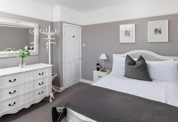 Settle under the covers of the king size bed and rest for the night amidst this thoughtfully decorated space.