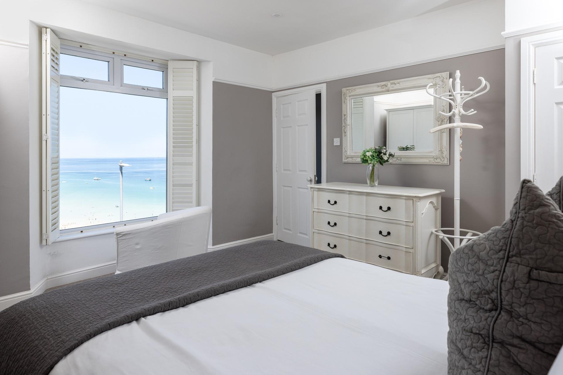 Wake up and open the shutters to the beautiful sea blues.