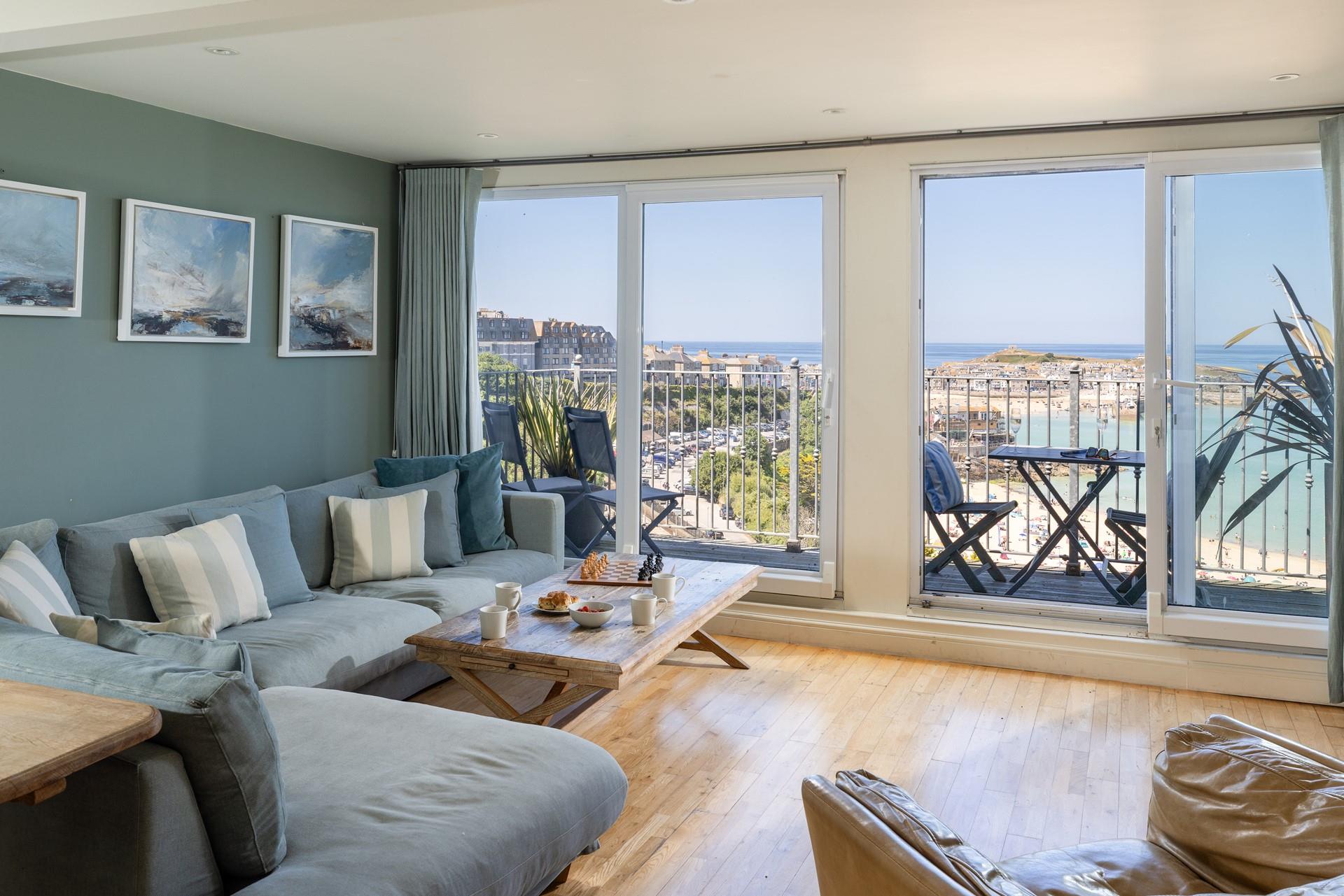 The spacious lounge is wonderfully inviting in winter and beautifully light and relaxing in summer.