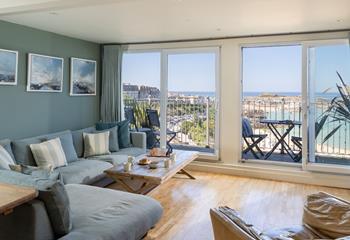 The spacious lounge is wonderfully inviting in winter and beautifully light and relaxing in summer.