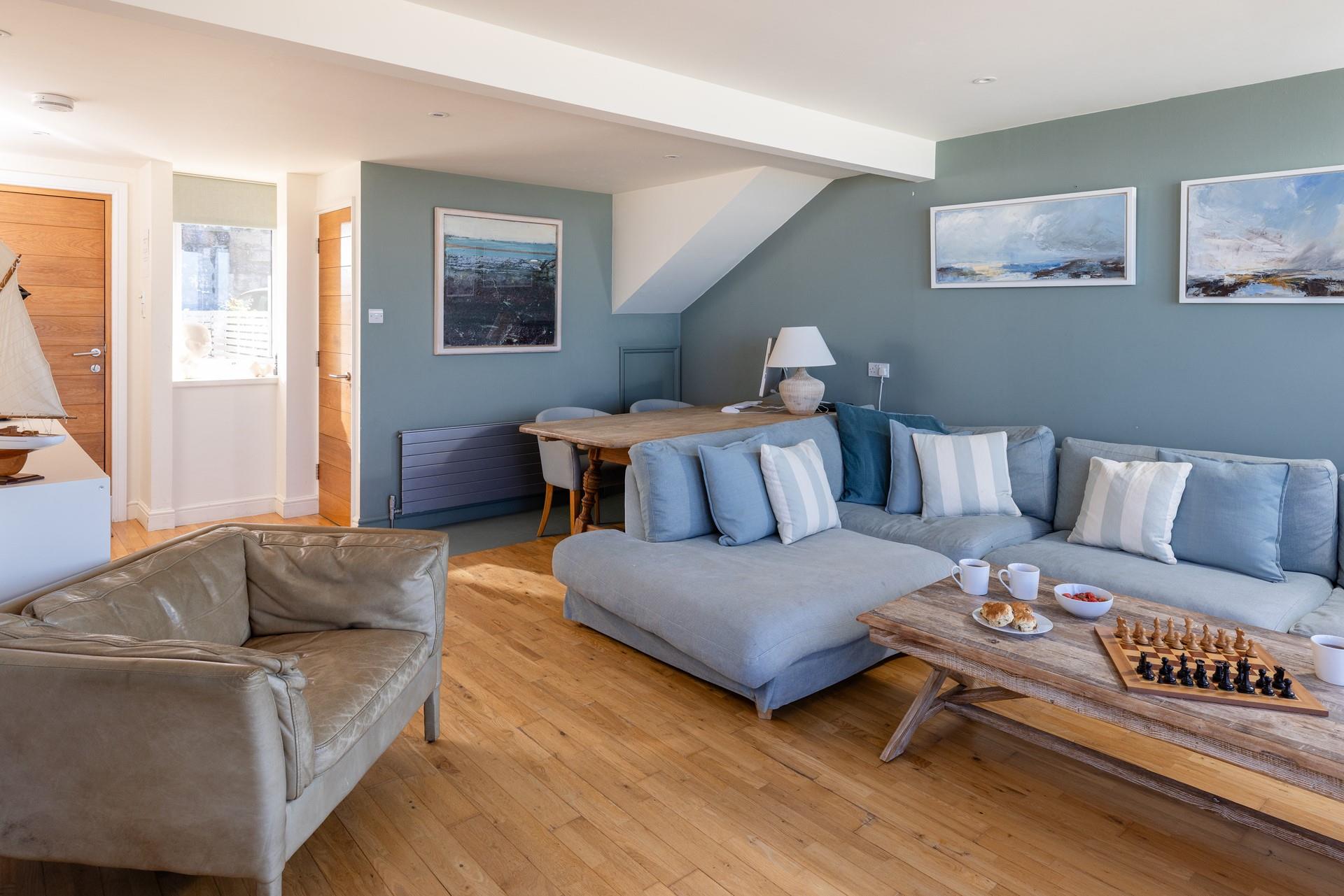 The spacious sofa is the perfect place to relax and unwind.