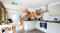 The living space is open plan, creating a free-flowing space for spending quality time together.