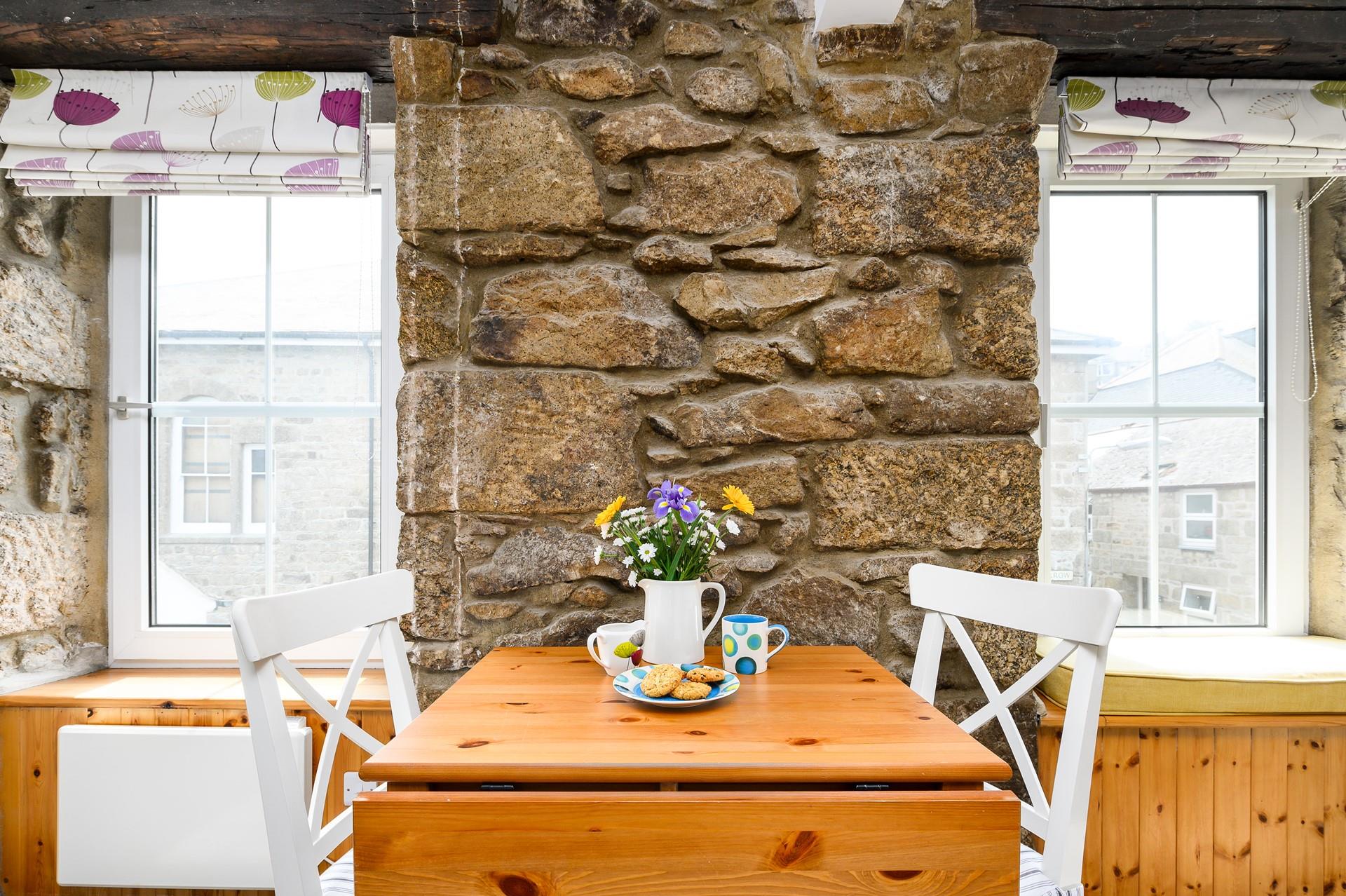 Enjoy a cream tea with lashings of Cornish clotted cream.