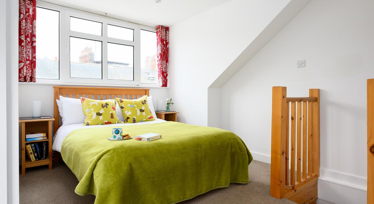 Soothing colours in the bedroom help you relax and unwind before bed.