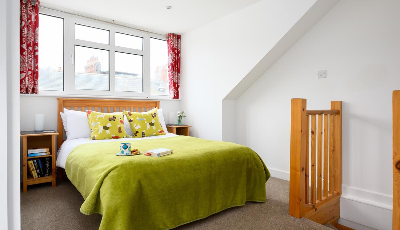 Soothing colours in the bedroom help you relax and unwind before bed.