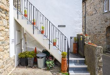 There is a private parking space just adjacent to the stone steps.