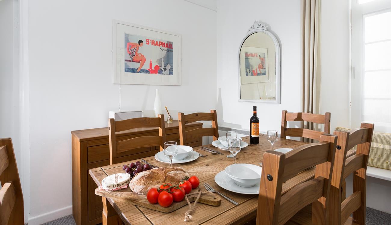 Traditional wood furniture combined with neutral interiors adds a subtle nautical vibe.