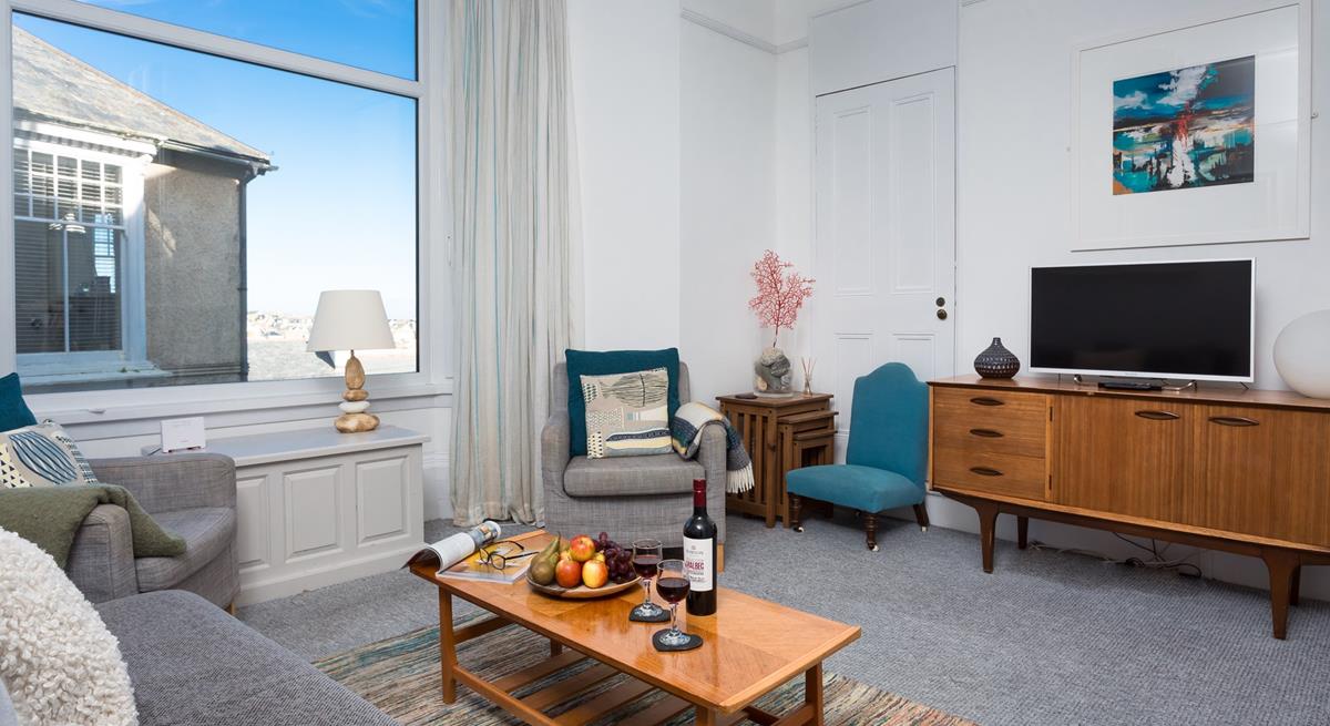 After a day out at the beach or exploring the shops, galleries and eateries in St Ives, snuggle up with a film in the lovely sitting room. 